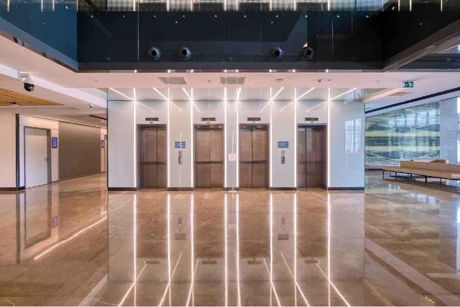 Elevator lobby with polished marble floors