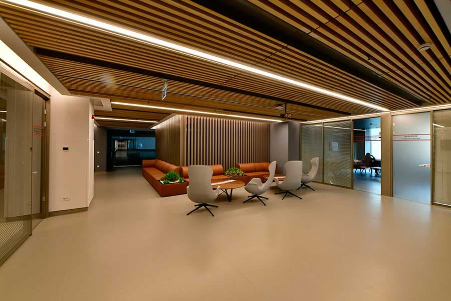 Floor lounge with wood-slat ceiling