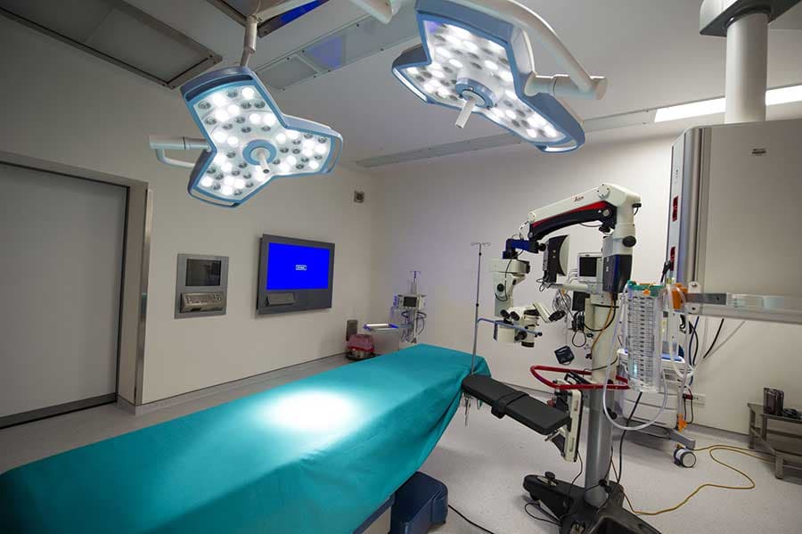 Operating room with surgical microscope