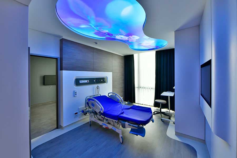 Premium patient room with blue LED ceiling