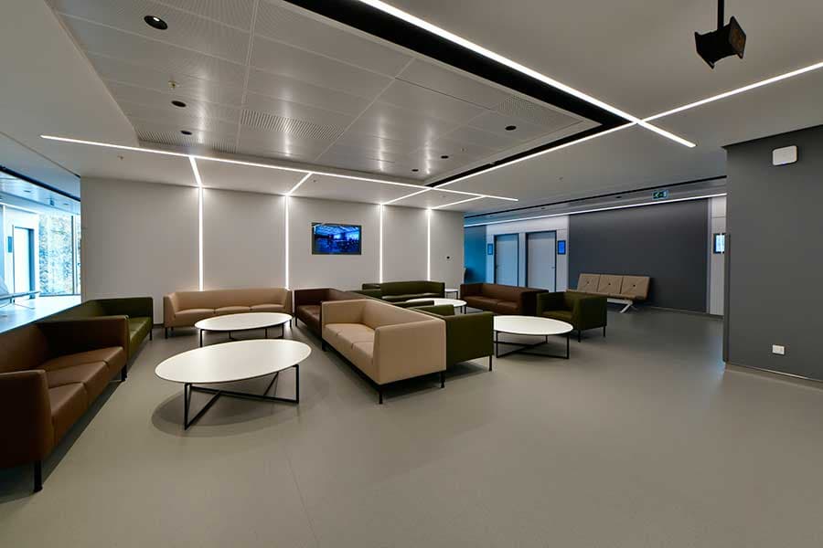 Patient waiting lounge with modern sofas